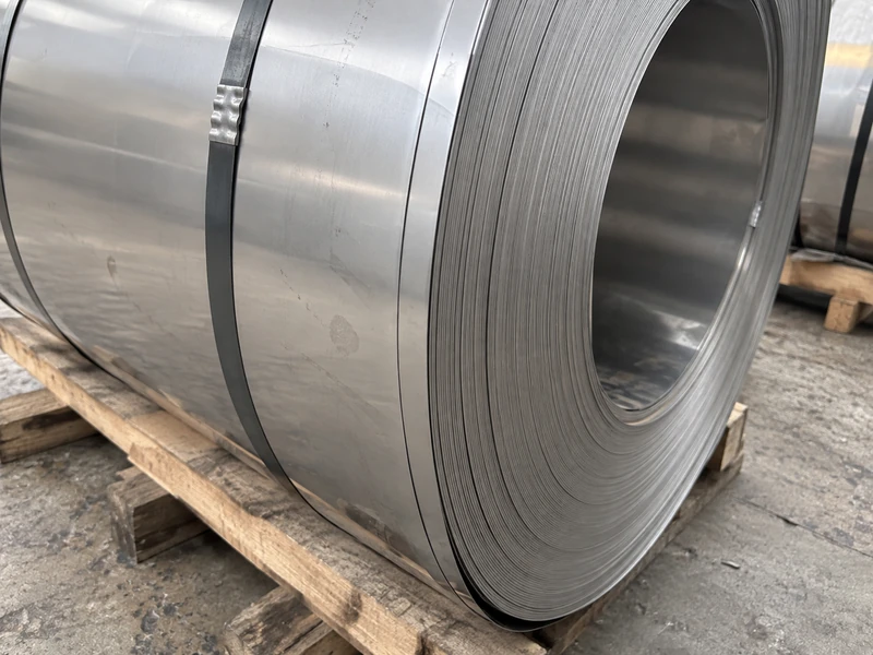 Close-up of a cold rolled stainless steel coil, the wraps tight and the cut edge clean.