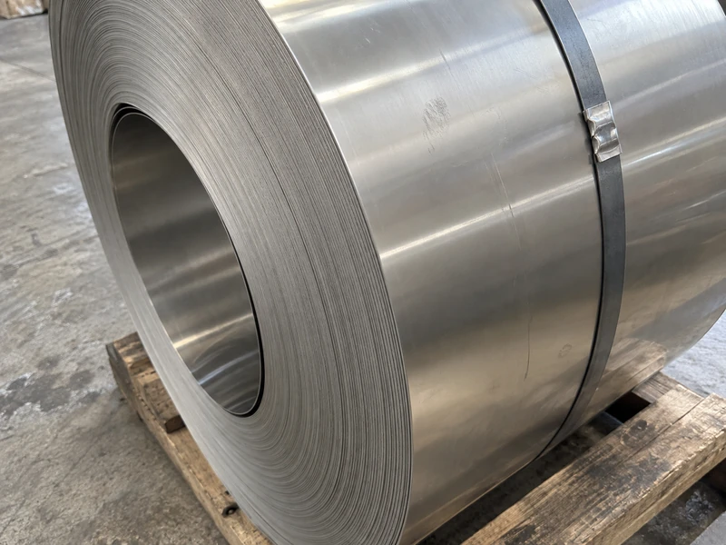 Close-up of a cold rolled stainless coil, the wraps tight and the cut edge clean.